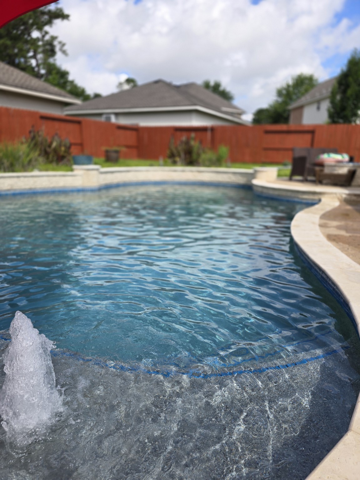 Clean swimming pool water after pool service